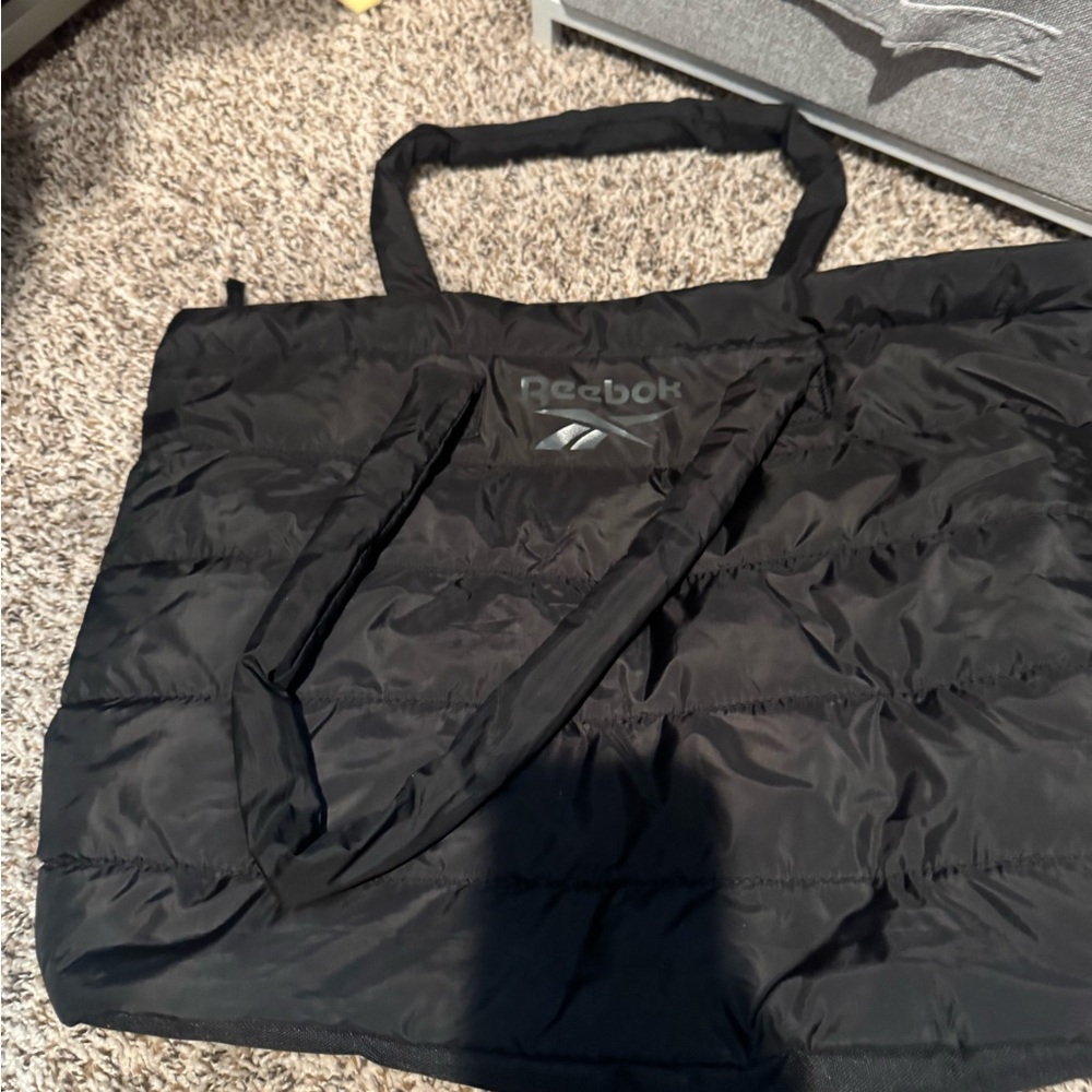 Reebok Black Fabric Puffer Tote bag. Big enough for laptop and textbooks.